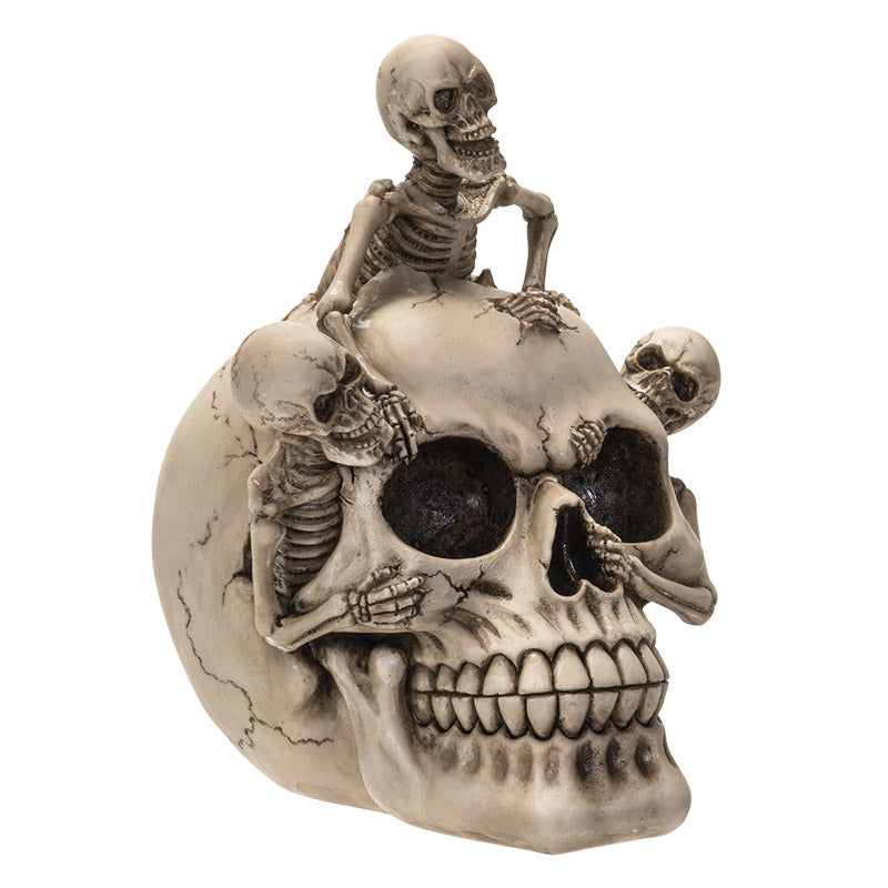 Skull with 3 Climbing Skeletons Statue