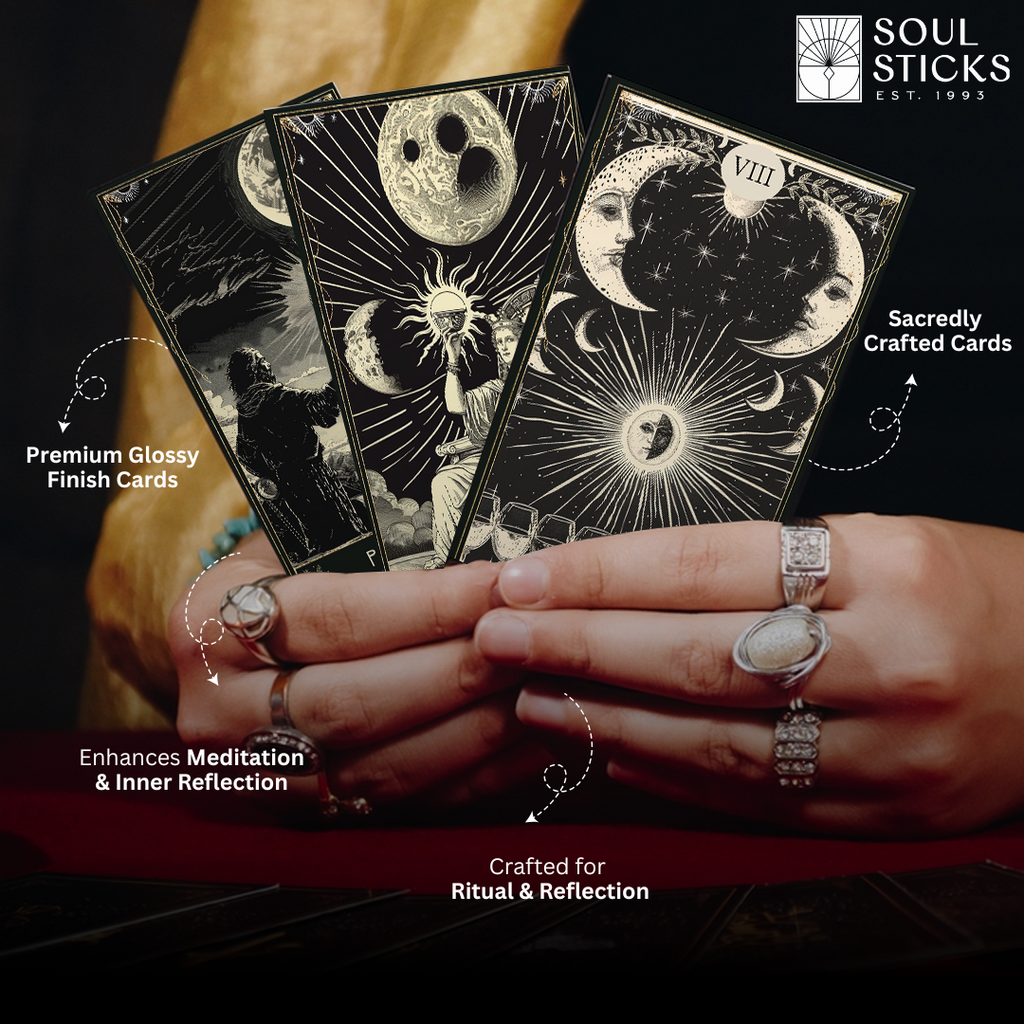 Three cards held in hands:
“Hands holding three glossy Mystic’s Path tarot cards with intricate moon-and-sun illustrations.”