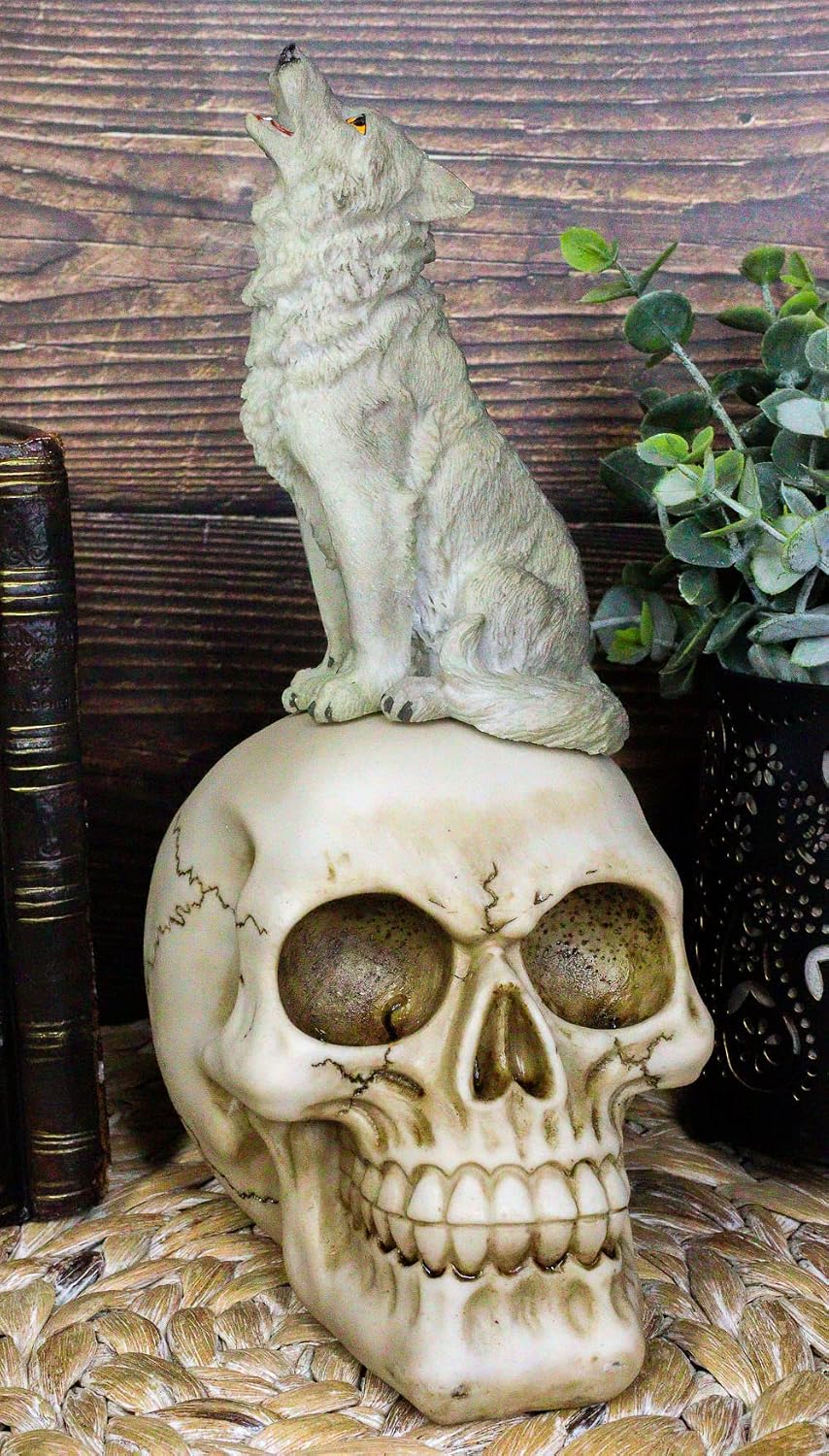 Howling Gray Wolf Sitting On Graveyard Skull Figurine