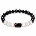 8mm Black Tourmaline and Selenite bracelet with black cylinder centerpiece and rose-gold-colored spacers on white background