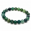 8mm green moss agate stretch bracelet with polished round beads and natural moss-like inclusions on white