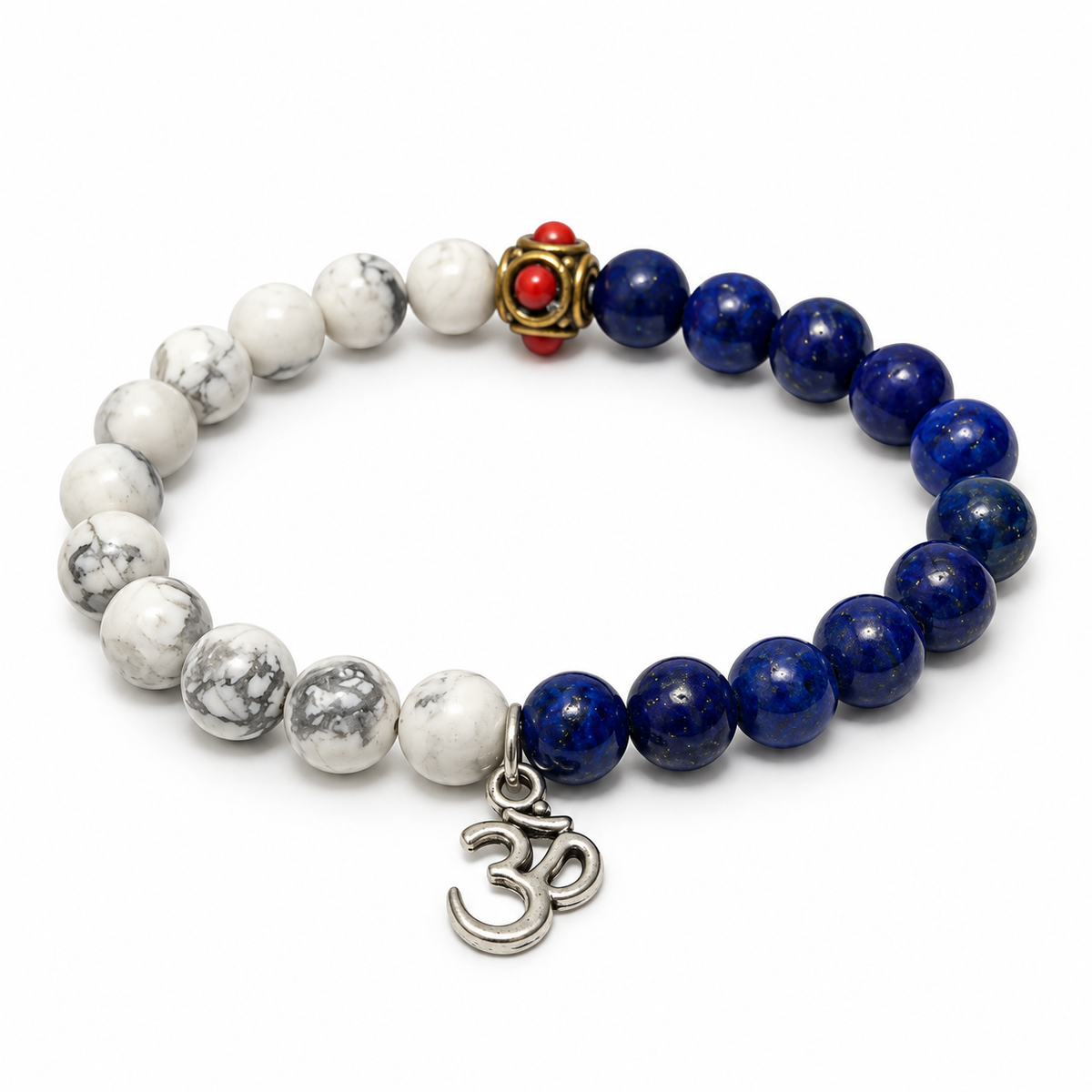 8mm lapis lazuli and howlite stretch bracelet with upright silver-tone Om charm and red-accent decorative bead on white