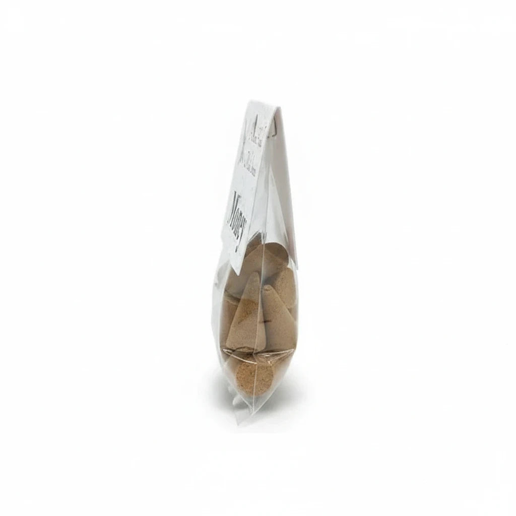 Crystal Fairy Patch Money premium hand-made cone incense in a clear plastic bag, side profile view.