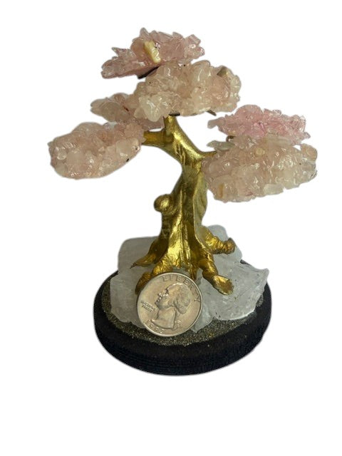 Crystal Fairy Patch rose quartz bonsai tree with gold trunk on a quartz and pyrite base for home decor and spiritual healing.