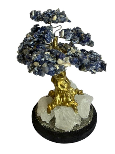 Crystal Fairy Patch Sodalite bonsai tree with blue crystal leaves, gold trunk, and a raw quartz and pyrite base for home decor.