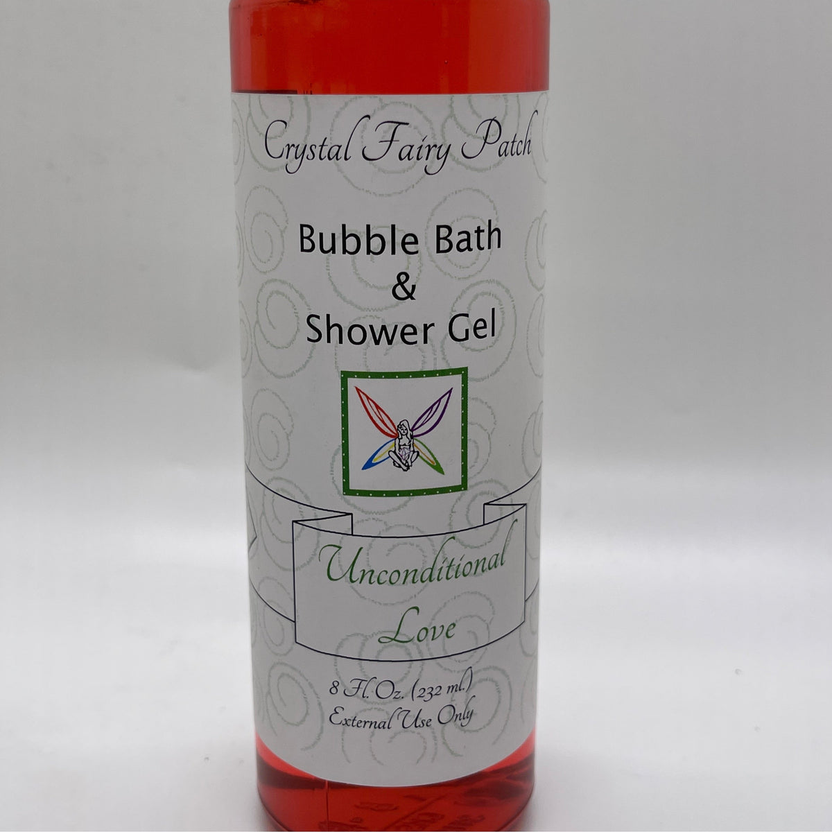 Crystal Fairy Patch Unconditional Love shower gel and bubble bath in a clear bottle with a decorative fairy label