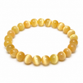 8mm Orange (Dyed) Selenite Bracelet on white background