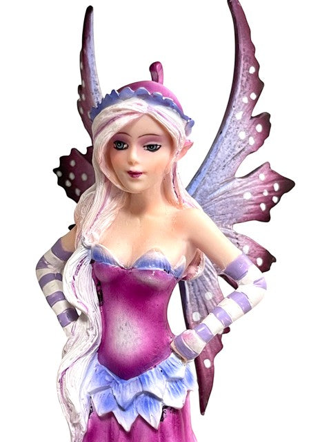 My Store fairy figurine with purple and white striped arm warmers, pink hair, and butterfly wings.