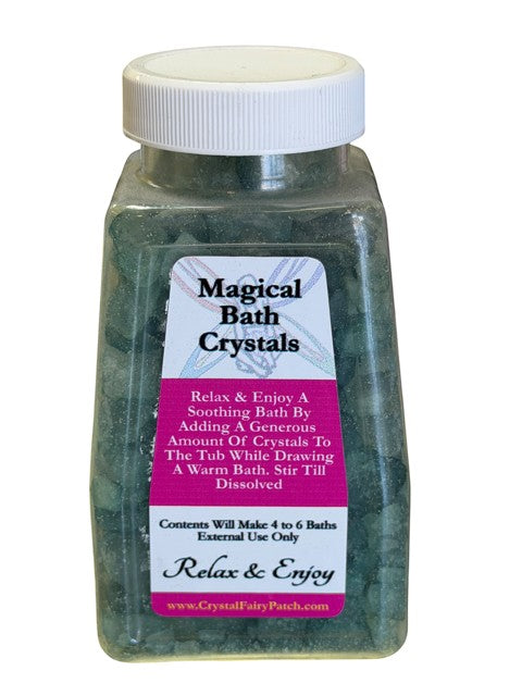 My StoreHere Crystal Fairy Patch Aventurine Bath Salts in a clear plastic jar with a white lid. Green crystals fill the jar.