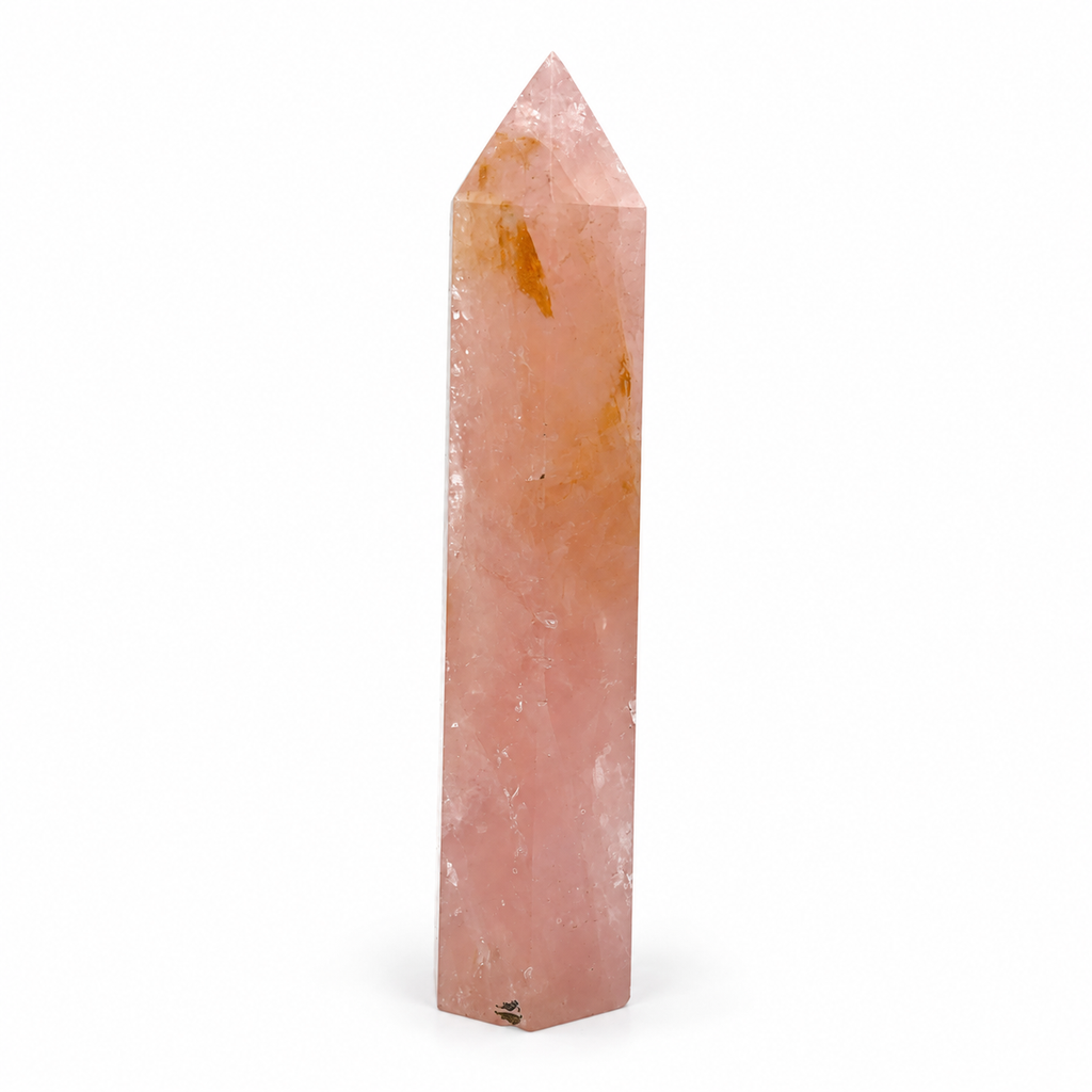 Rose quartz tower, third view showing natural inclusions and base markings