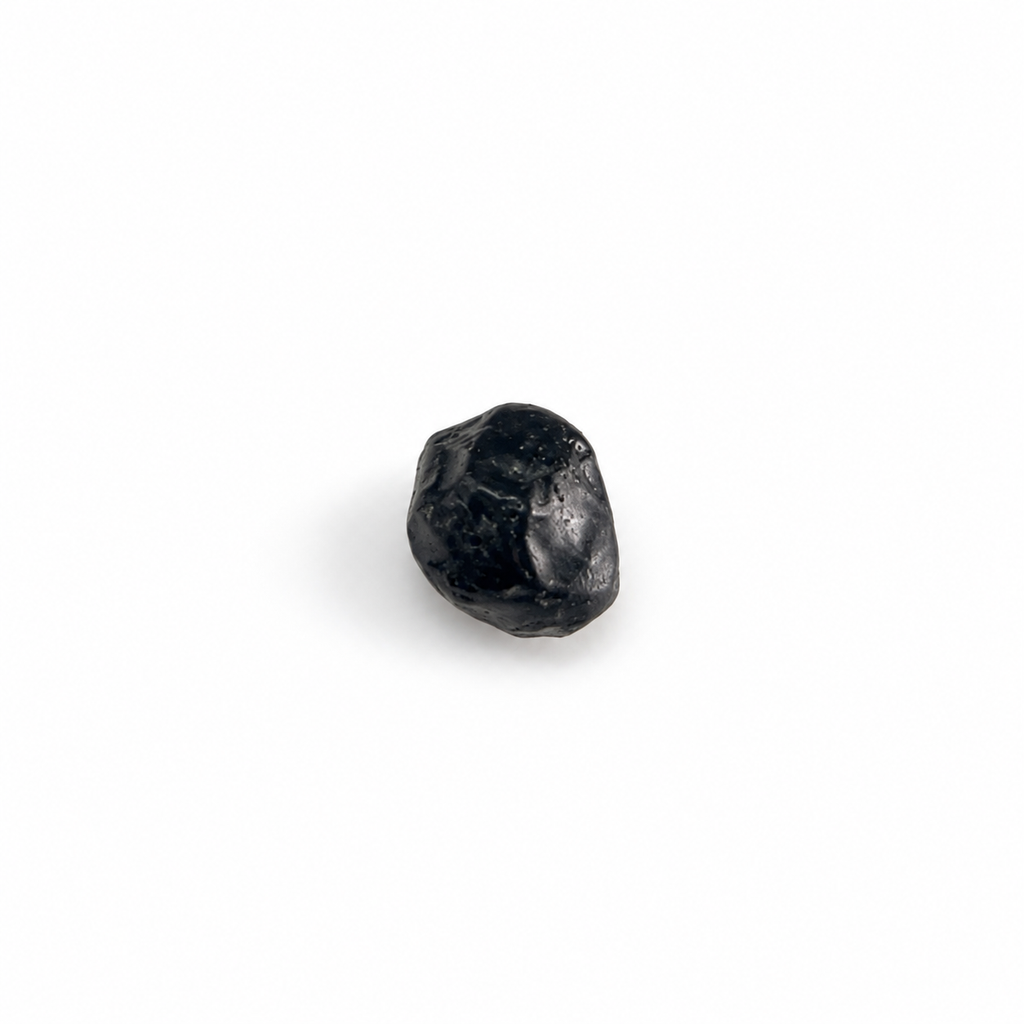 Close-up of Apache Tear featured stone